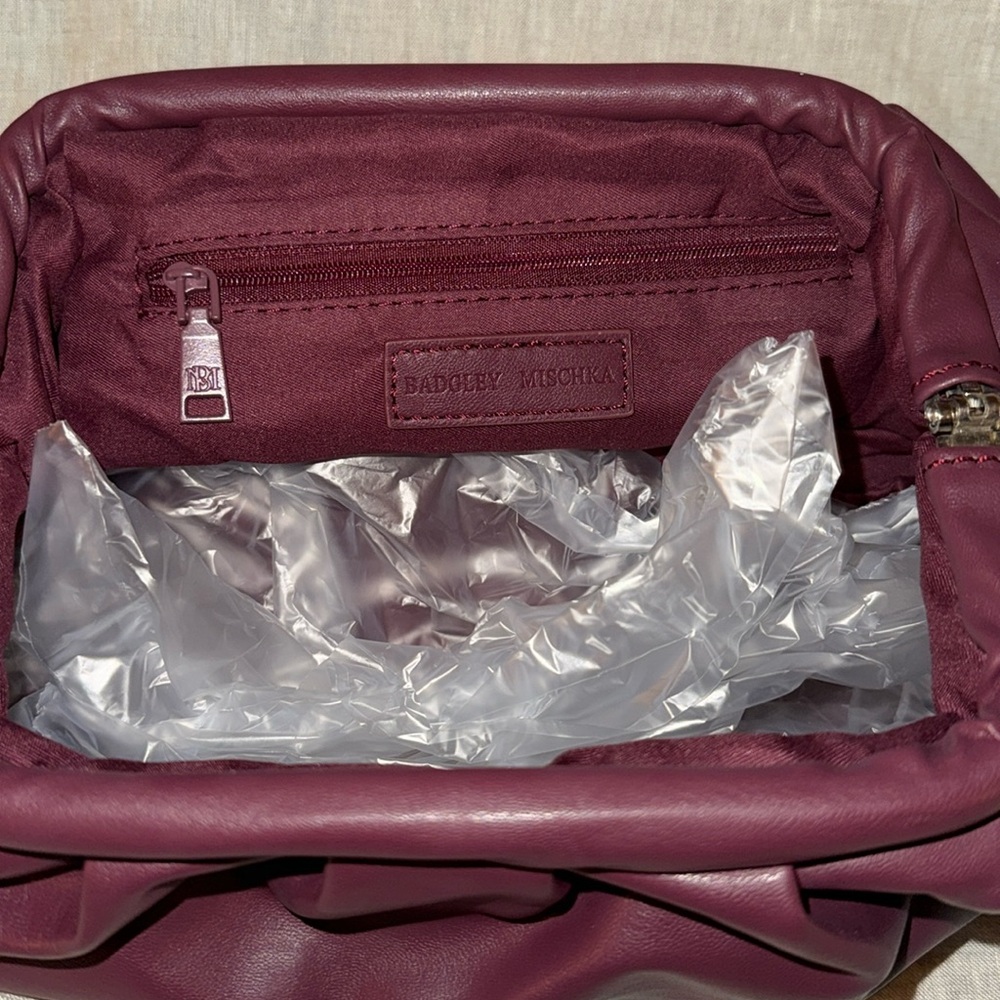 NWT Badgley Mischka Wrapped Frame Clutch: Plum
Perfect fall bag - Picture 9 of 9